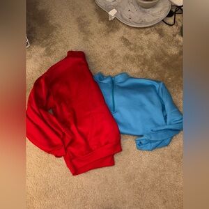 Red and teal quarter zips size large
